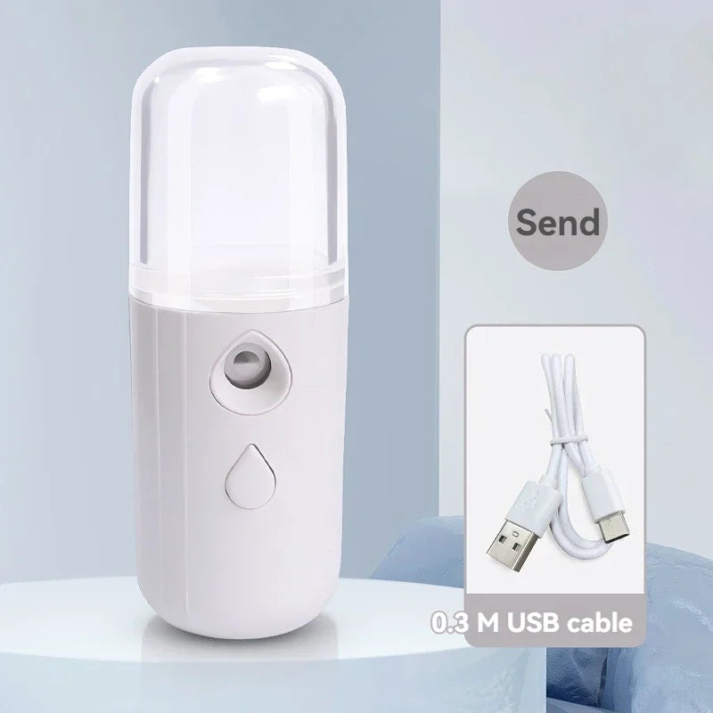 Handheld mini spray face Steam meter Nano spray water refill meter charging Portable eye moistening face humidifier household