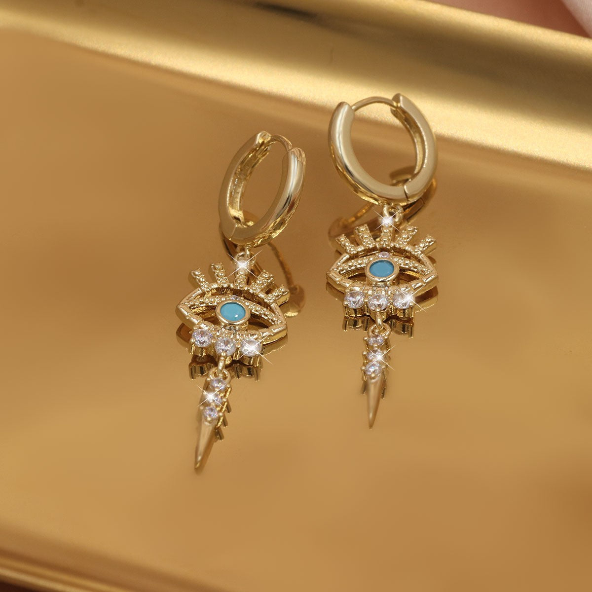 A Pair of Zirconium-encrusted Evil Eye Pendants