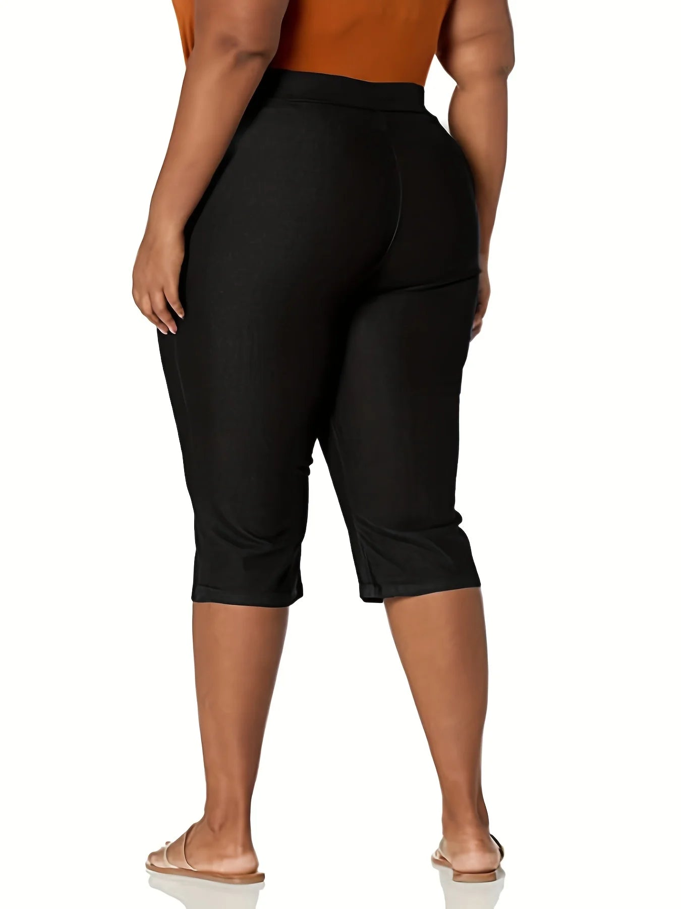 New plus-size women's knitted fabric high-grade pocket design solid color tight casual seven-cent pants in the summer of 2024