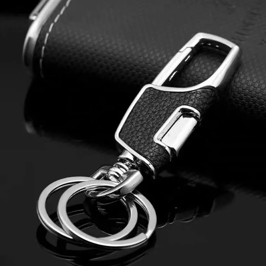 Double-ring metal keychain, simple and stylish. Thick and substantial texture, anti-lost and portable, showcasing men's taste.