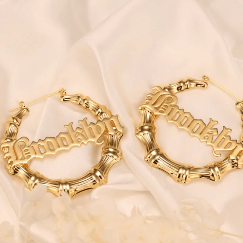 A unique 3-in-1 personalized name bamboo earring and necklace set, customized with Halloween decoration inspiration