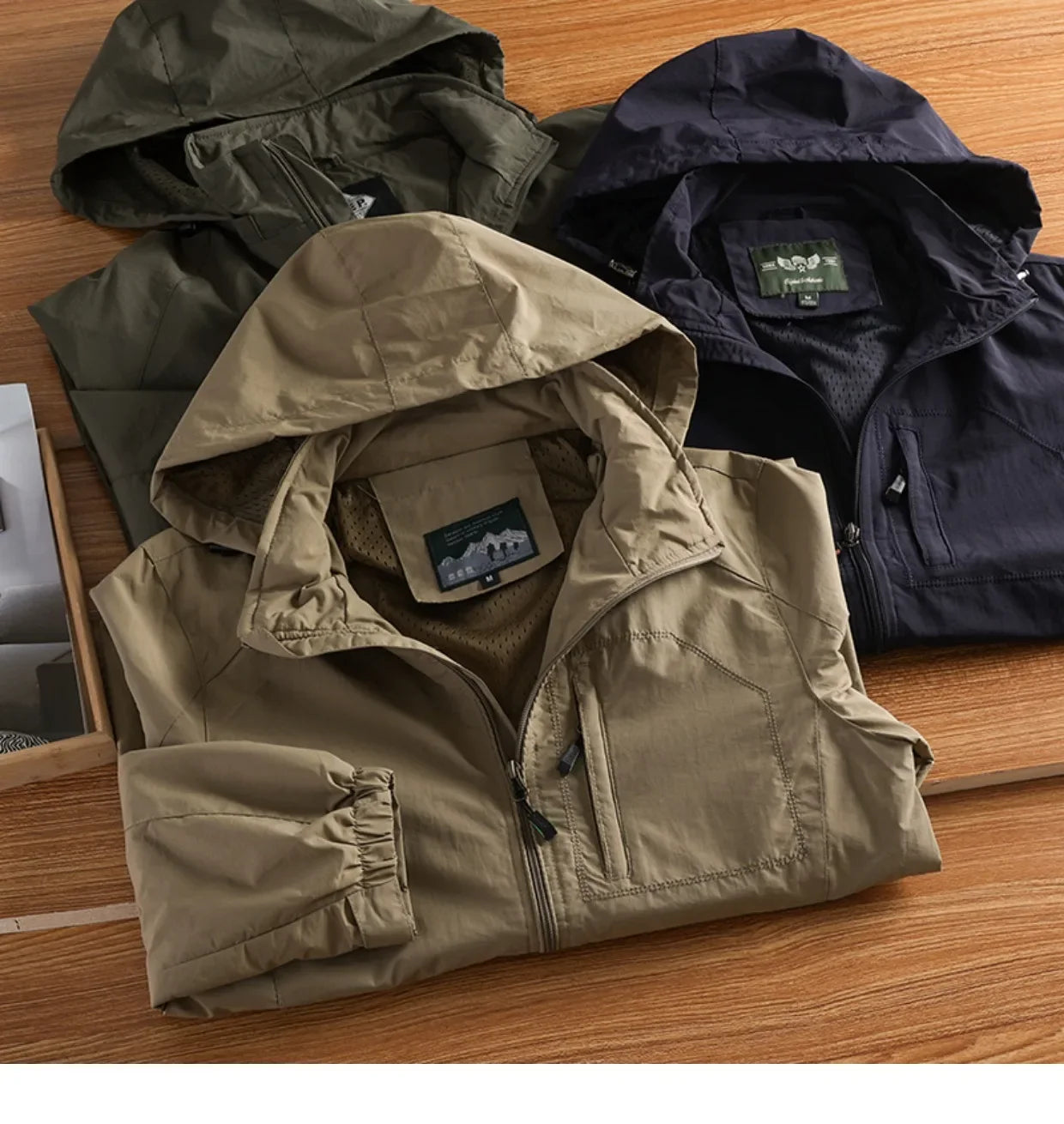 Men's Jacket Spring and Autumn Three Proof Fashion Casual Loose Hooded Professional Outdoor Windproof Windbreaker Coat