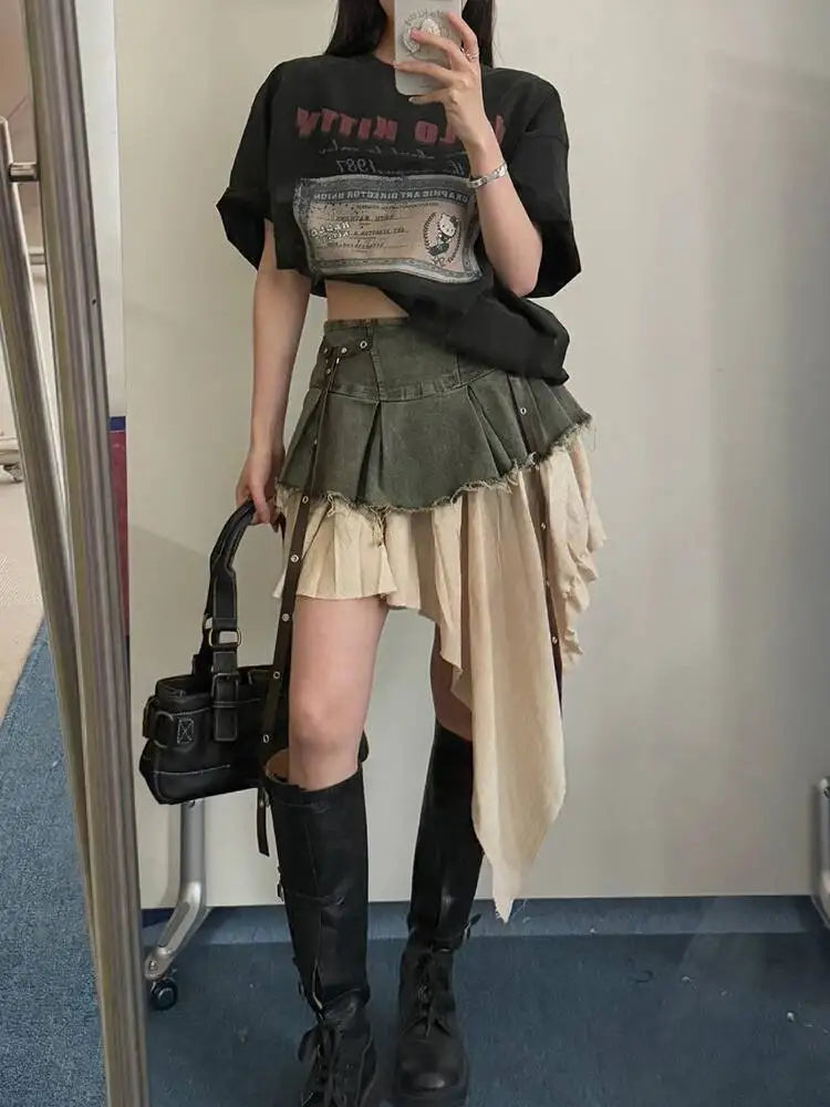 EAM Color-block Irregular Spliced High Elastic Waist A-line Mini Denim Skirt Women Fashion Tide New Spring Autumn 2026 30A3307